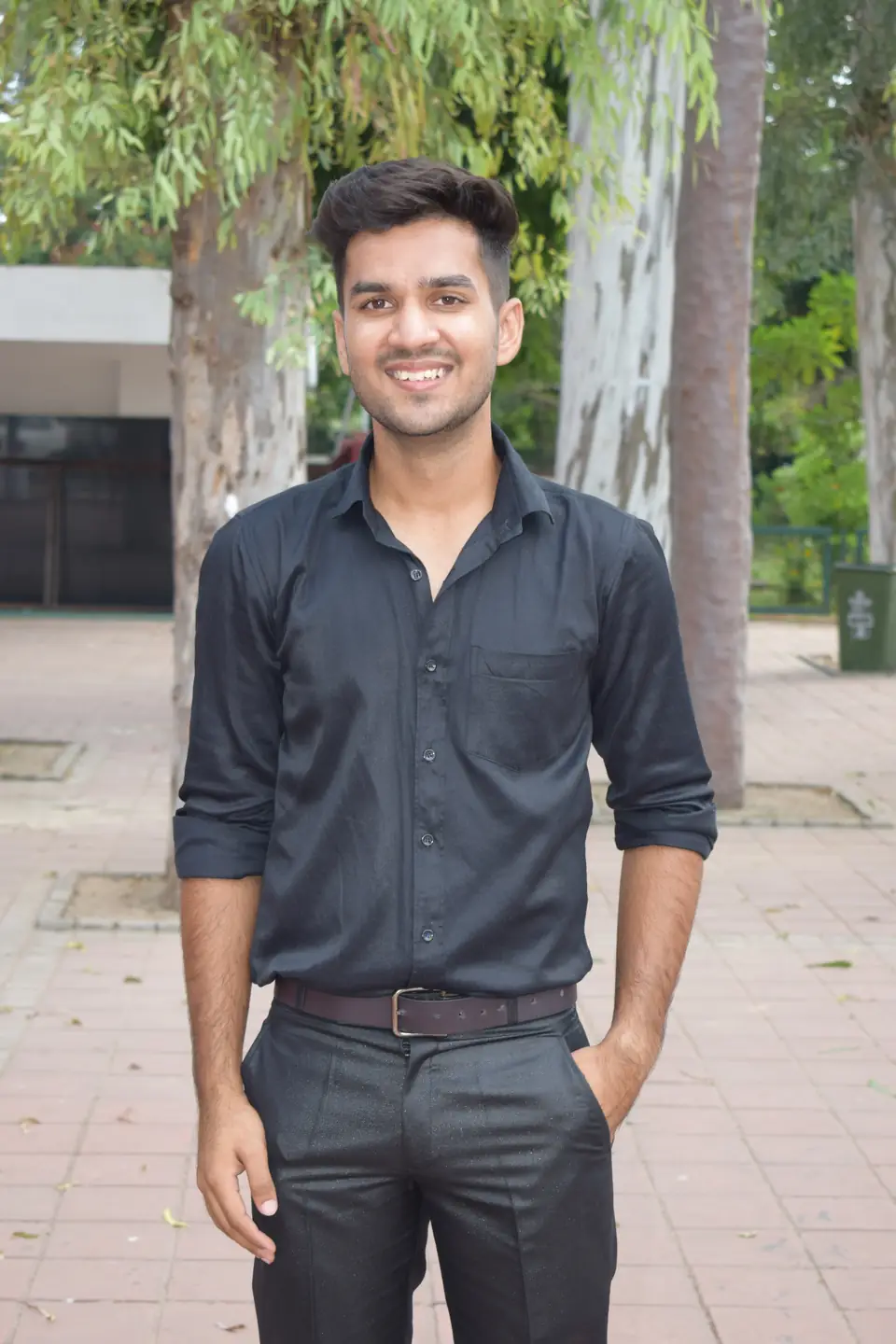 Pritish Bhatti in black clothes, natural front-facing shot